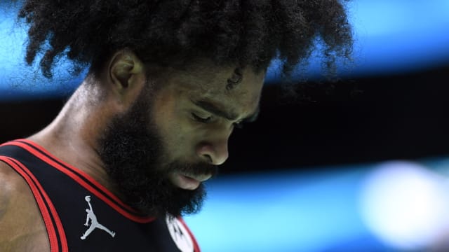 Chicago Bulls guard Coby White (0) reflects during a time out during the second half against the Charlotte Hornets at the Spectrum Center